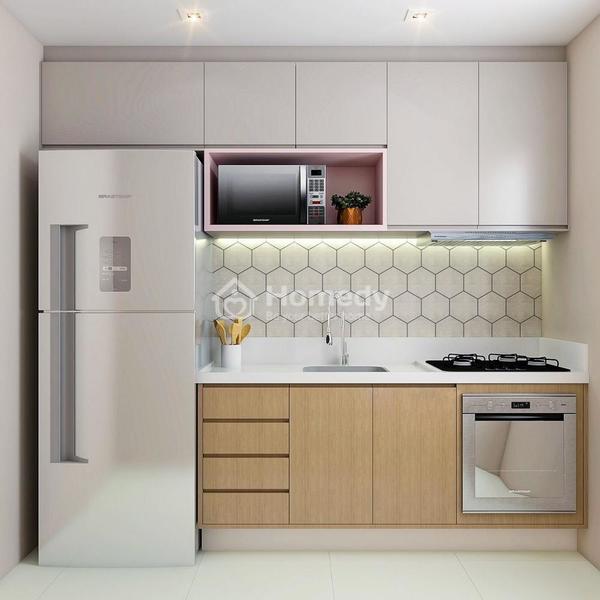 Chỉ cần chọn tông sáng và tủ bếp treo tường cũng giúp bạn có được không gian phòng bếp nhỏ nhắn nhưng tiện nghi